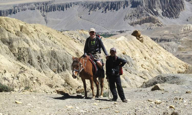 trekker hiring horse after he got sick while trekking in annapurna