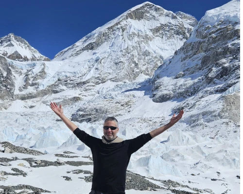 Trekkers Celebrating At Everest Base Camp